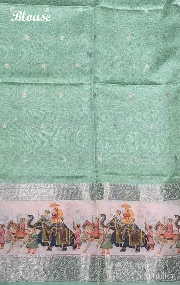 Light green printed saree with elephant border