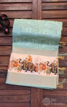 Light green printed saree with elephant border