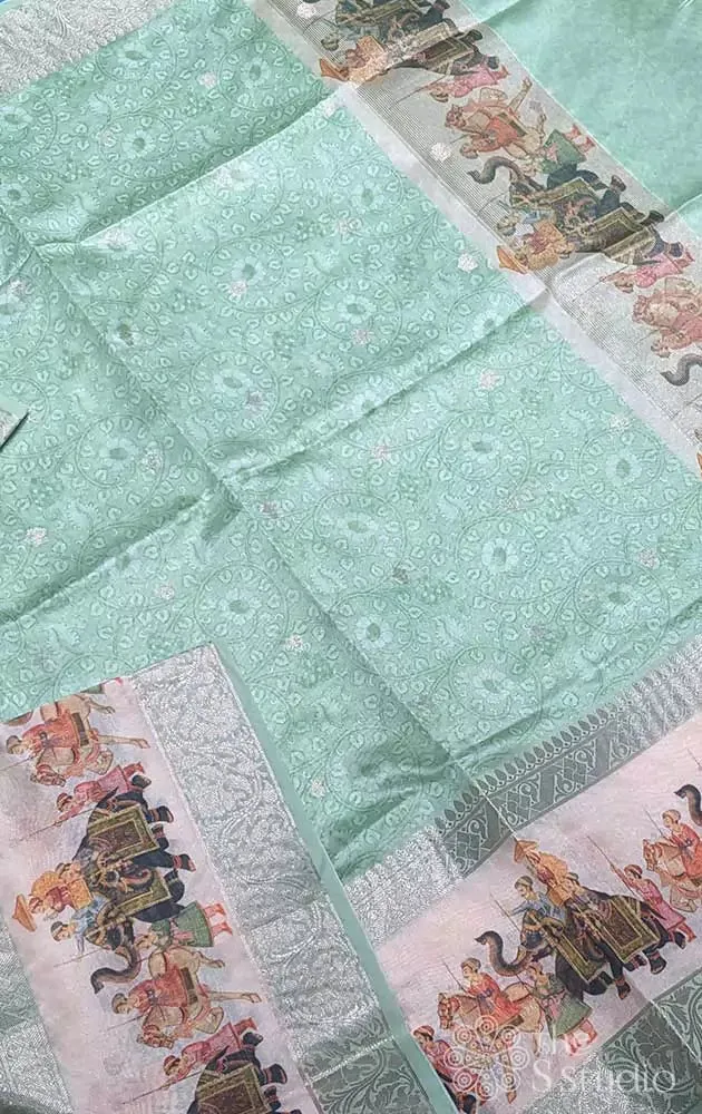 Light green printed saree with elephant border
